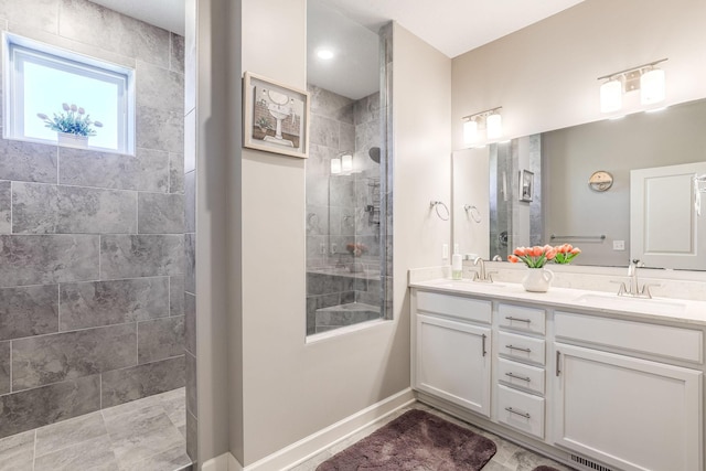 6944 Xanthus Ln N, Maple Grove, MN 55311 - full bath with double vanity, walk in shower, and baseboards