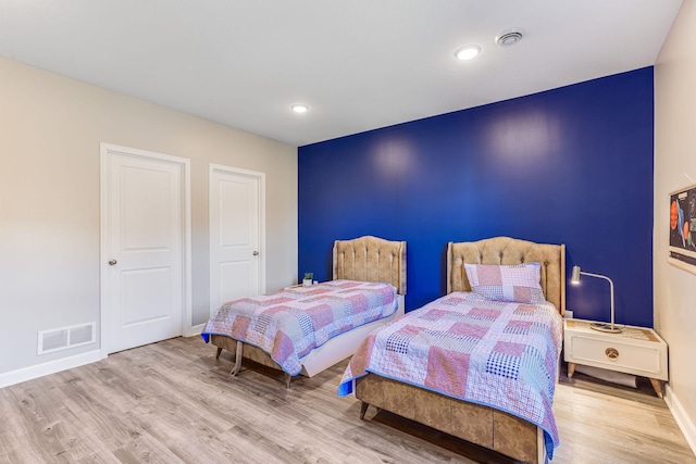 6944 Xanthus Ln N, Maple Grove, MN 55311 - bedroom with wood finished floors, baseboards, and recessed lighting