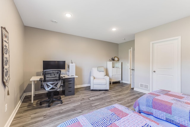 6944 Xanthus Ln N, Maple Grove, MN 55311 - bedroom featuring wood finished floors, baseboards, and recessed lighting