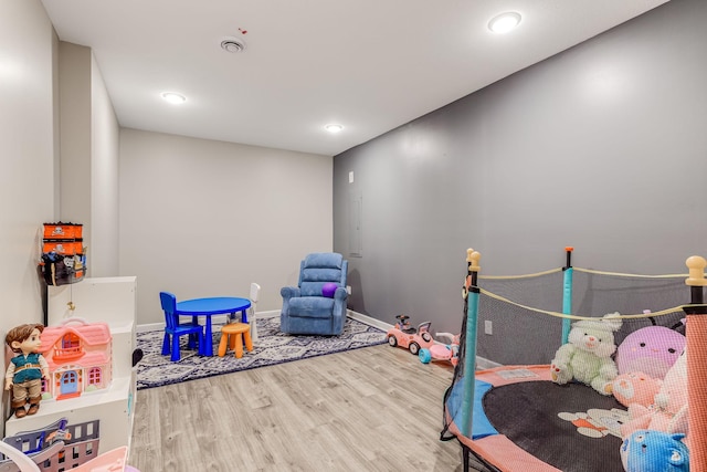 6944 Xanthus Ln N, Maple Grove, MN 55311 - game room with wood finished floors, recessed lighting, and baseboards