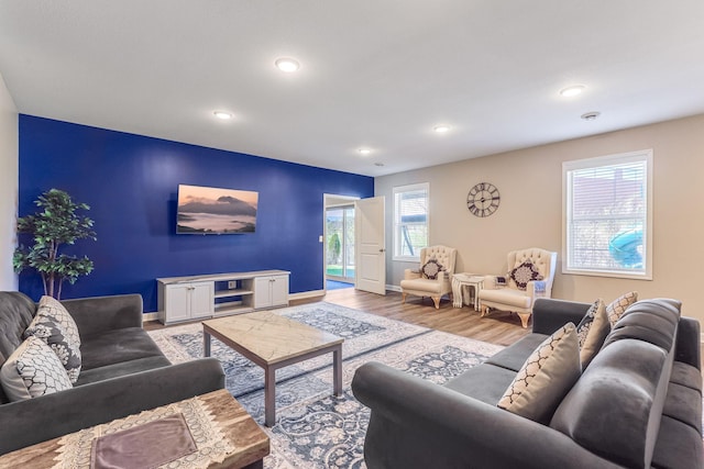 6944 Xanthus Ln N, Maple Grove, MN 55311 - living room with light wood finished floors, recessed lighting, and baseboards
