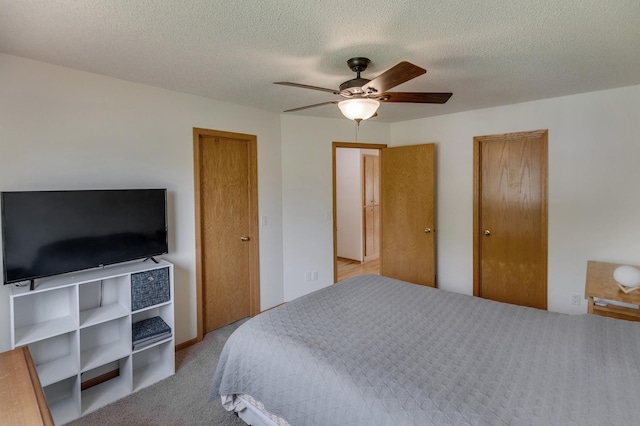 217 Hickory Ln E, Shakopee, MN 55379 - carpeted bedroom with ceiling fan and a textured ceiling