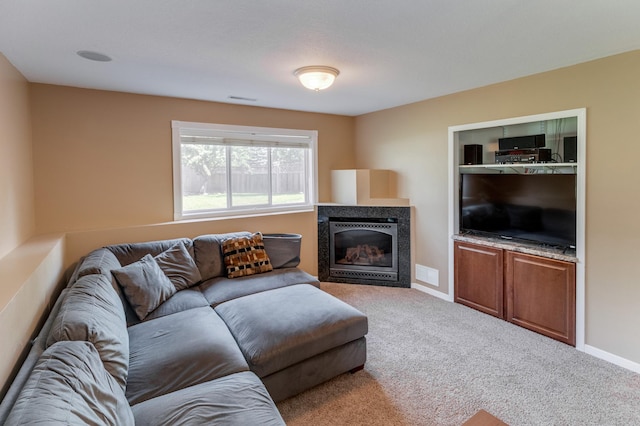 217 Hickory Ln E, Shakopee, MN 55379 - living area with carpet, a fireplace, and baseboards