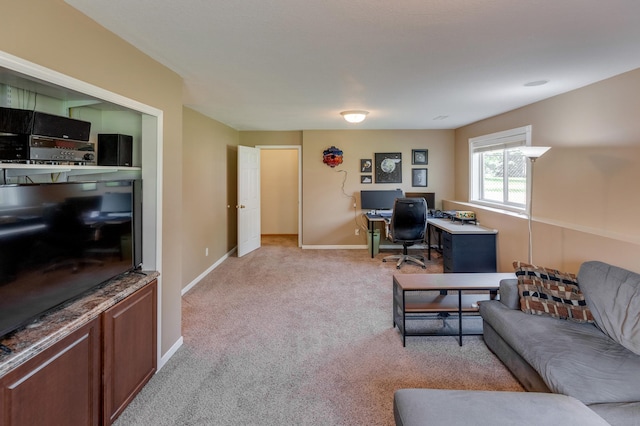 217 Hickory Ln E, Shakopee, MN 55379 - living area with an office area, light carpet, and baseboards