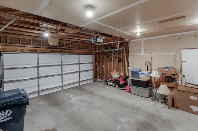 217 Hickory Ln E, Shakopee, MN 55379 - garage featuring a garage door opener