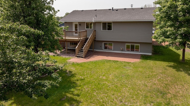 217 Hickory Ln E, Shakopee, MN 55379 - back of house with stairway, a deck, a patio, a lawn, and roof with shingles
