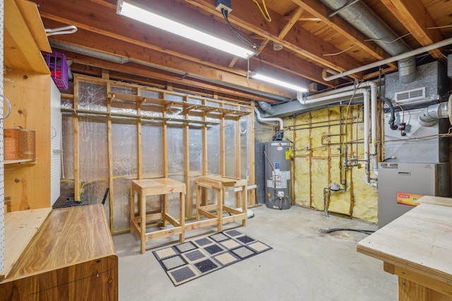3049 12th St NW, New Brighton, MN 55112 - unfinished basement with gas water heater and heating unit