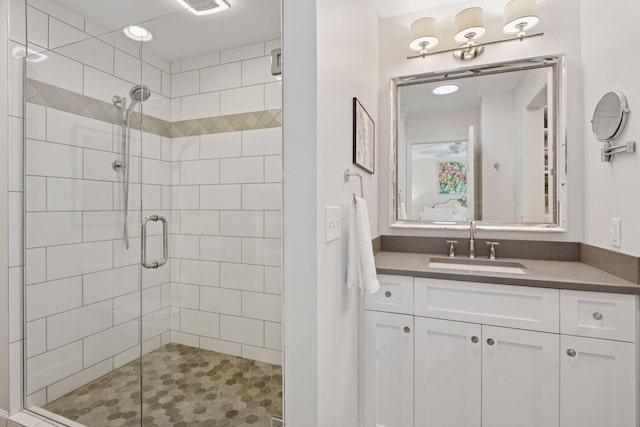 6050 Blake Ridge Rd, Edina, MN 55436 - bathroom featuring a shower stall and vanity