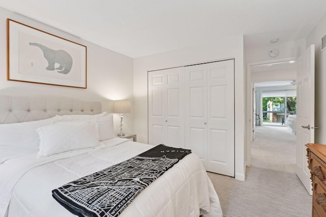 6050 Blake Ridge Rd, Edina, MN 55436 - bedroom featuring light carpet and a closet