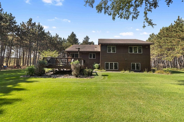 12584 County 18 SW, Brainerd, MN 56401 - back of property featuring a deck and a lawn