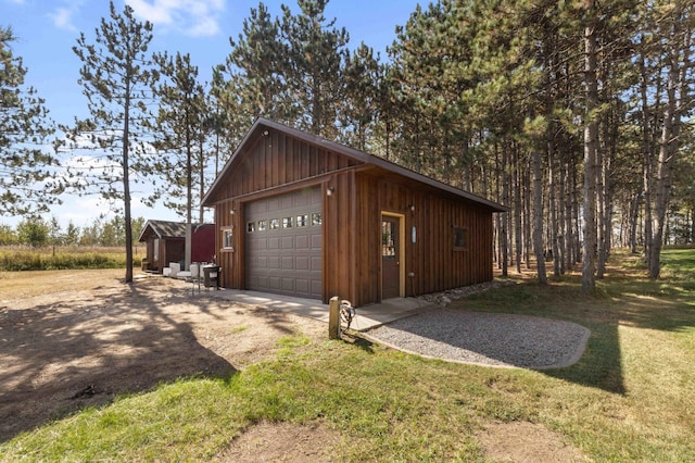 12584 County 18 SW, Brainerd, MN 56401 - detached garage featuring driveway