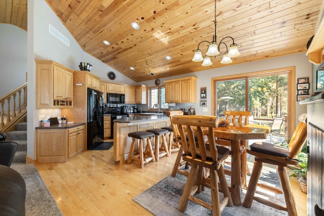 12584 County 18 SW, Brainerd, MN 56401 - dining room with wooden ceiling, stairway, a chandelier, lofted ceiling, and light wood-style floors