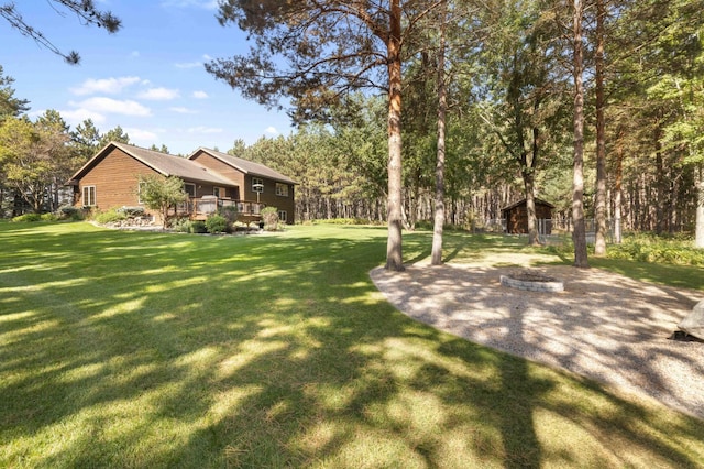 12584 County 18 SW, Brainerd, MN 56401 - view of grassy yard with a wooden deck
