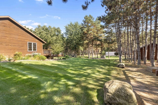 12584 County 18 SW, Brainerd, MN 56401 - view of green lawn featuring a deck