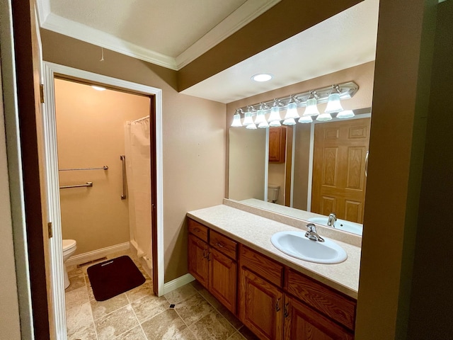 416 Rako St SW, Bemidji, MN 56601 - bathroom featuring toilet, vanity, crown molding, and baseboards