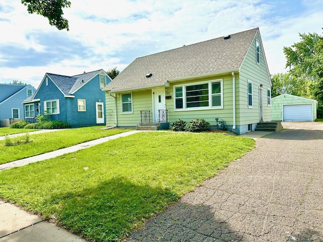 1576 Nebraska Ave E, Saint Paul, MN 55106 - view of front of property featuring a garage, an outdoor structure, a front yard, and roof with shingles