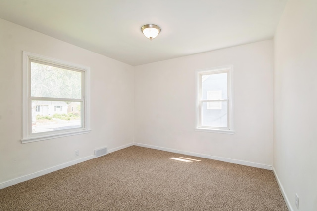 1576 Nebraska Ave E, Saint Paul, MN 55106 - carpeted empty room with baseboards
