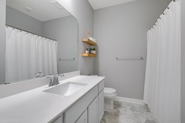 6645 91st St S, Cottage Grove, MN 55016 - bathroom featuring vanity, toilet, marble look tiles, a shower with curtain, and baseboards