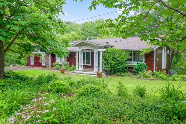 5076 Woodgate Ct, Minnetonka, MN 55345 - ranch-style home featuring a front yard and roof with shingles