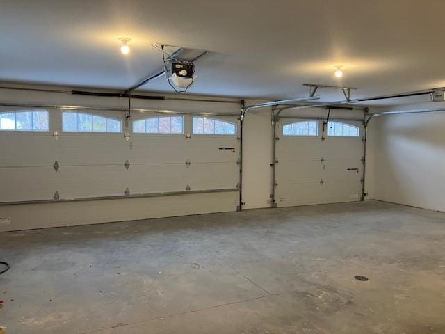 7865 Ski Chalet Dr, Breezy Point, MN 56472 - garage featuring a garage door opener