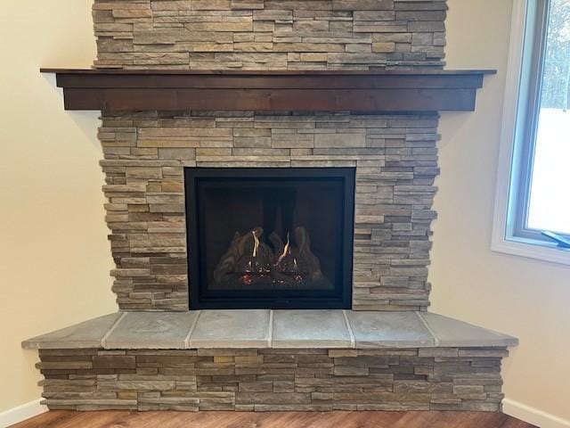 7865 Ski Chalet Dr, Breezy Point, MN 56472 - detailed view of wood finished floors and baseboards