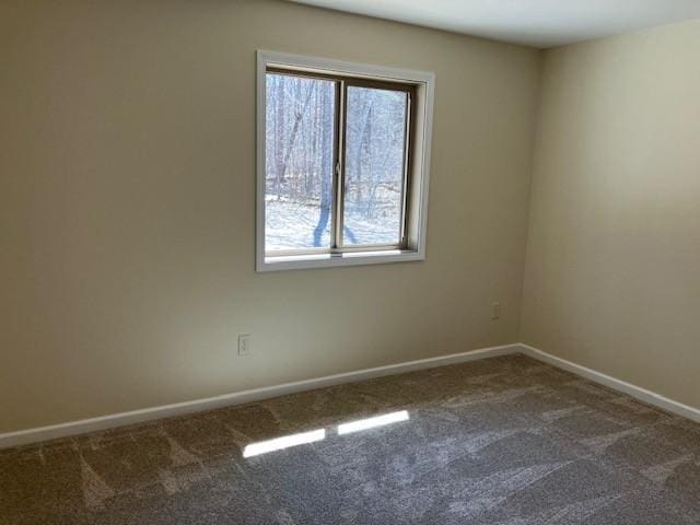 7865 Ski Chalet Dr, Breezy Point, MN 56472 - spare room featuring dark colored carpet and baseboards