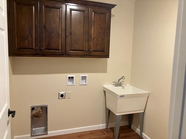 7865 Ski Chalet Dr, Breezy Point, MN 56472 - laundry room featuring washer hookup, hookup for an electric dryer, cabinet space, and baseboards