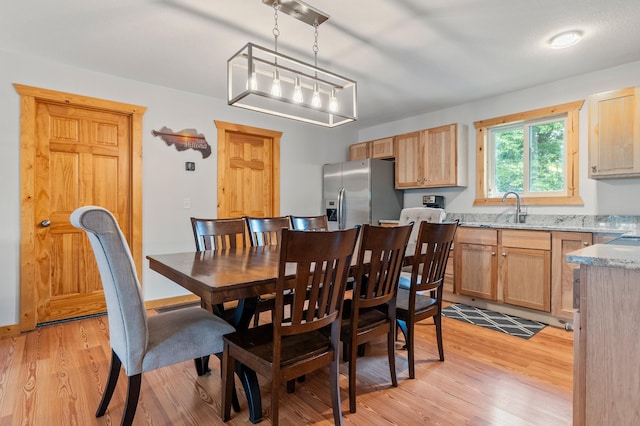 1874 Hidden Valley Ln NW, Leaf Valley Twp, MN 56354 - dining space with light wood-style floors