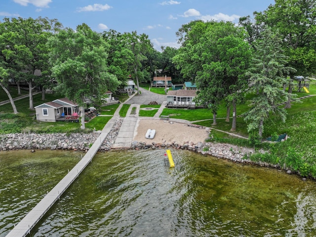 1874 Hidden Valley Ln NW, Leaf Valley Twp, MN 56354 - dock area featuring a water view and a lawn