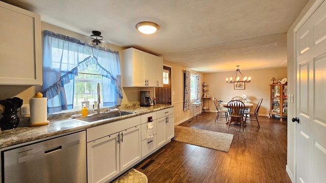 111 10th Ave SE, Elbow Lake, MN 56531 - kitchen featuring dishwasher, a sink, dark wood finished floors, a chandelier, and white cabinets