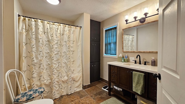 111 10th Ave SE, Elbow Lake, MN 56531 - full bath featuring vanity, stone tile flooring, a textured ceiling, toilet, and a shower with shower curtain