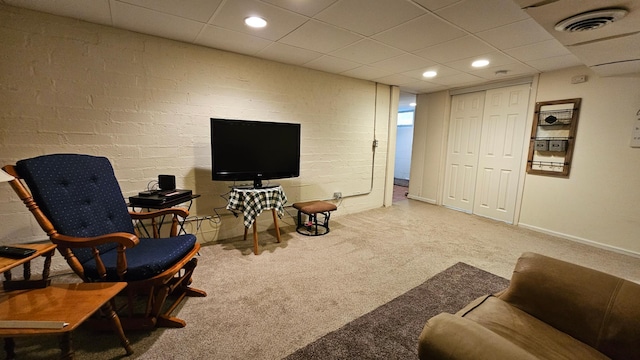 111 10th Ave SE, Elbow Lake, MN 56531 - carpeted living area with a paneled ceiling, recessed lighting, and baseboards
