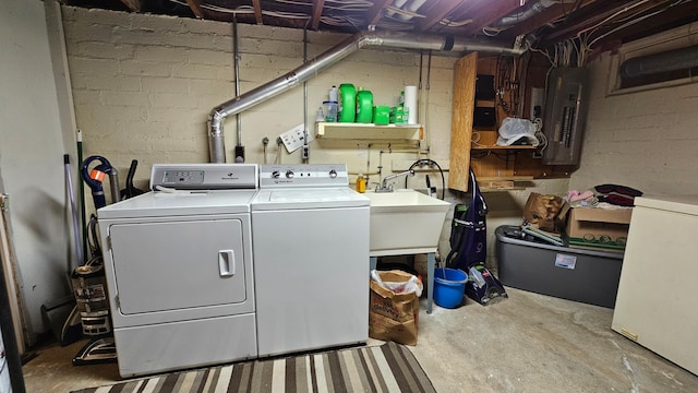 111 10th Ave SE, Elbow Lake, MN 56531 - washroom with washing machine and dryer and electric panel