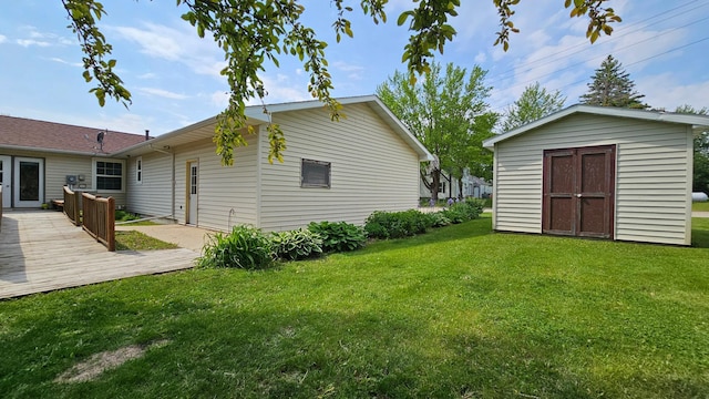 111 10th Ave SE, Elbow Lake, MN 56531 - view of grassy yard featuring a deck