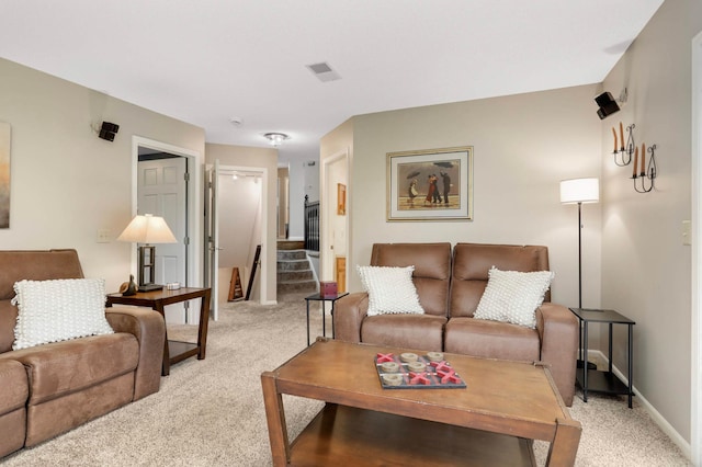 1366 140th Ln NW, Andover, MN 55304 - living area featuring light carpet, baseboards, and stairway