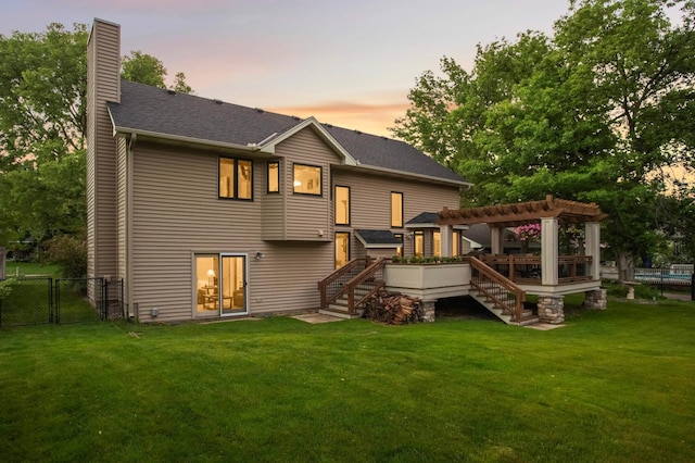 1366 140th Ln NW, Andover, MN 55304 - rear view of house featuring stairs, a pergola, a gate, a chimney, and a shingled roof