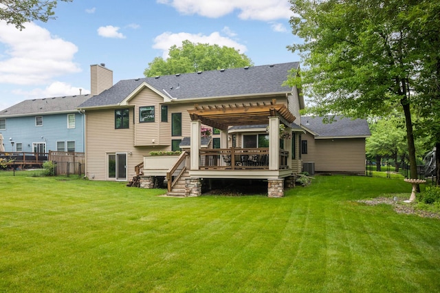 1366 140th Ln NW, Andover, MN 55304 - back of property with a pergola, a deck, central AC unit, a shingled roof, and a chimney