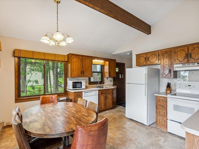 1474 Shamineau Dr, Motley, MN 56466 - kitchen featuring white appliances, under cabinet range hood, light countertops, a chandelier, and brown cabinets