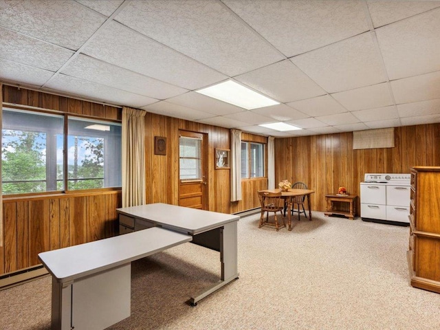 1474 Shamineau Dr, Motley, MN 56466 - home office featuring independent washer and dryer, wooden walls, healthy amount of natural light, light colored carpet, and a drop ceiling