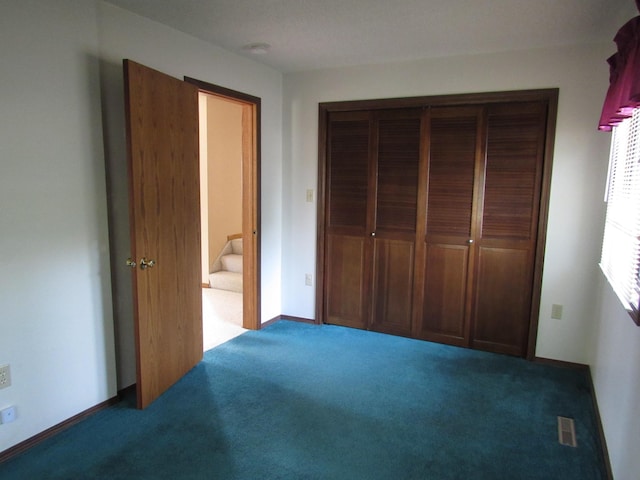 457 Rohrer St, Round Lake, MN 56167 - unfurnished bedroom featuring carpet flooring and a closet