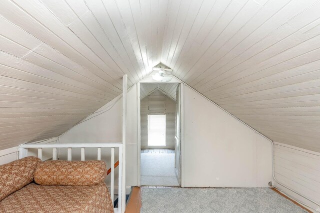921 2nd St, Mankato, MN 56001 - bonus room featuring carpet, vaulted ceiling, and wood ceiling