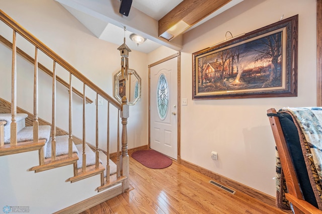 18000 10th St SW, Hawley, MN 56549 - entrance foyer featuring wood finished floors, stairway, and baseboards