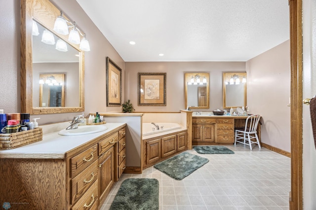 18000 10th St SW, Hawley, MN 56549 - bathroom featuring two vanities, a bath, and baseboards