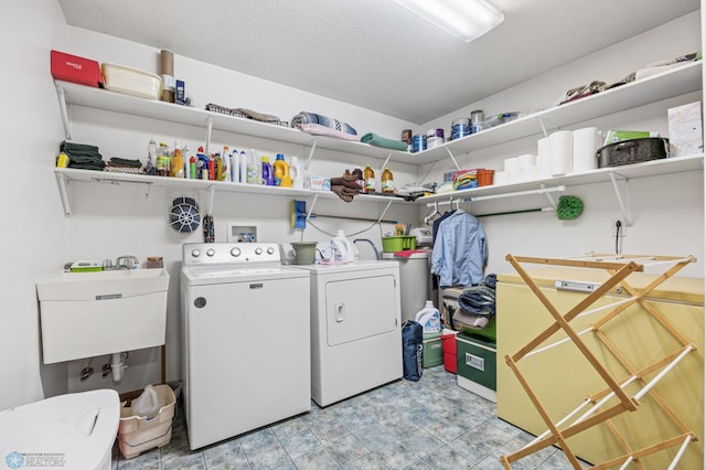 18000 10th St SW, Hawley, MN 56549 - laundry room with independent washer and dryer and a textured ceiling