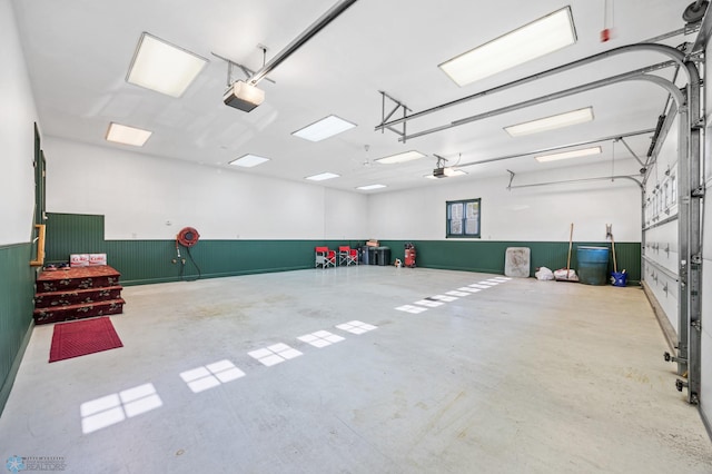 18000 10th St SW, Hawley, MN 56549 - garage with wainscoting and a garage door opener