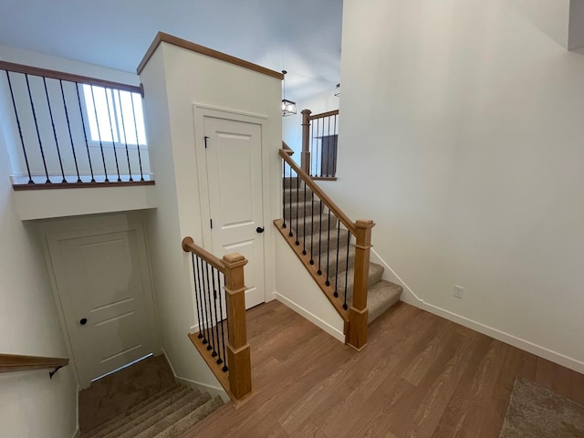 32755 Naples St NE, Cambridge, MN 55008 - stairs with wood finished floors and baseboards