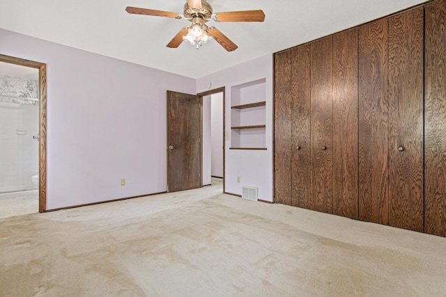 8200 77th St S, Cottage Grove, MN 55016 - unfurnished bedroom featuring carpet flooring, a ceiling fan, and connected bathroom
