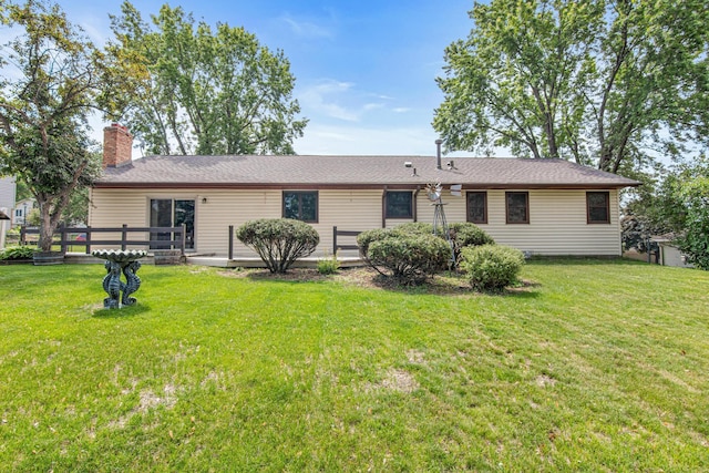 8200 77th St S, Cottage Grove, MN 55016 - rear view of property with a chimney and a lawn