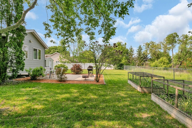 1506 6th Ave N, Sartell, MN 56377 - view of yard with a garden and a patio