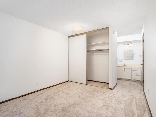 4600 Cedar Lake Rd S Unit 6, Saint Louis Park, MN 55416 - unfurnished bedroom featuring light carpet and a closet